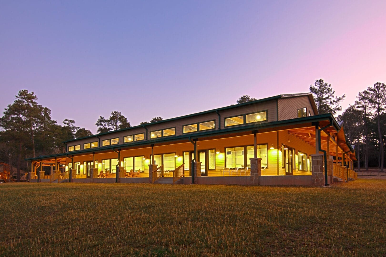 Large building illuminated at twilight.