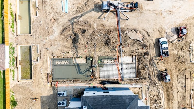 Aerial view of construction site with machinery.