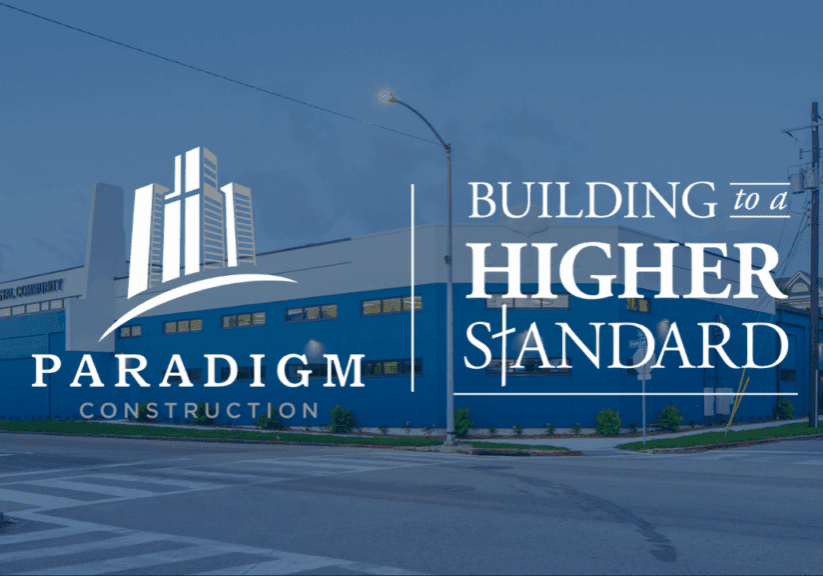 Paradigm Construction building with company logo.
